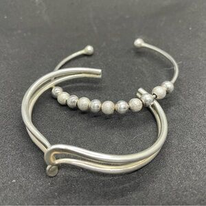Two sterling silver bangle bracelet, beaded one is stamped 925